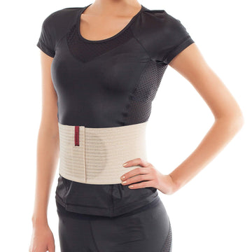 ORTONYX umbilical hernia belt, beige abdominal support binder with front closure and targeted silicone pad over navel.