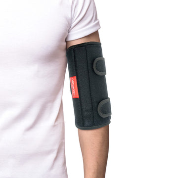 ORTONYX elbow support brace immobilizer splint on forearm, black with dual hook-and-loop straps; cubital tunnel brace.
