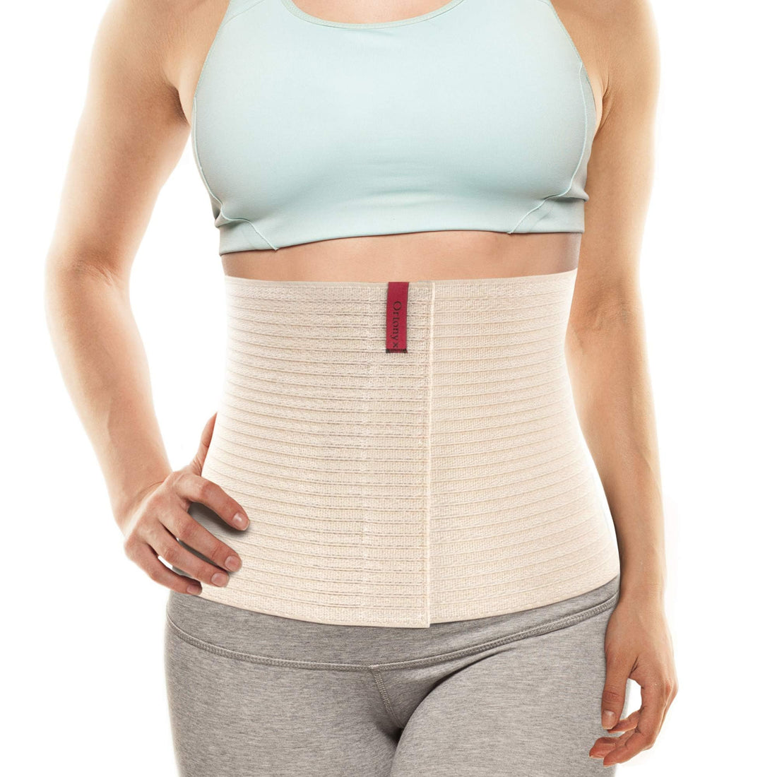ORTONYX abdominal binder 524010 on torso, beige ribbed breathable elastic with Velcro-adjustable closure, 10.25 in height