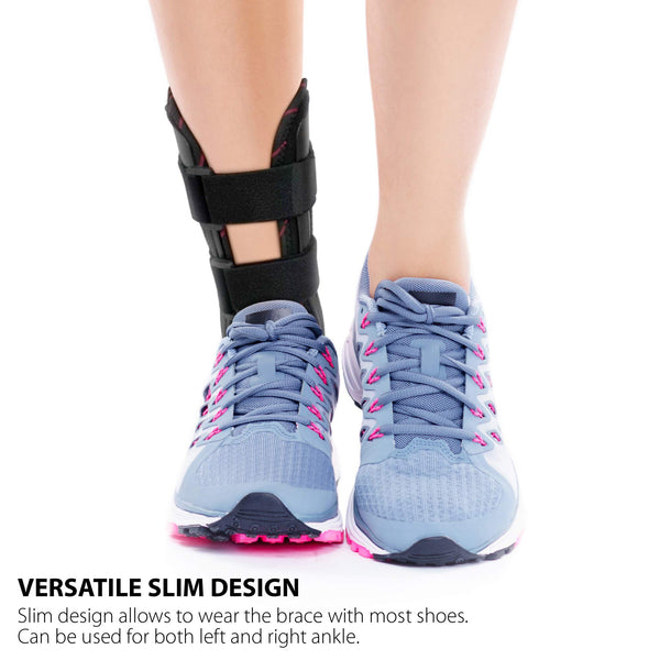 Leg wearing ankle stabilizer brace stirrup splint with rigid stirrup shells, hook-and-loop straps, slim fit with shoes