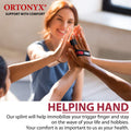 Hand high-fiving wearing ORTONYX Trigger Finger Splint, adjustable Velcro finger brace immobilizing index finger