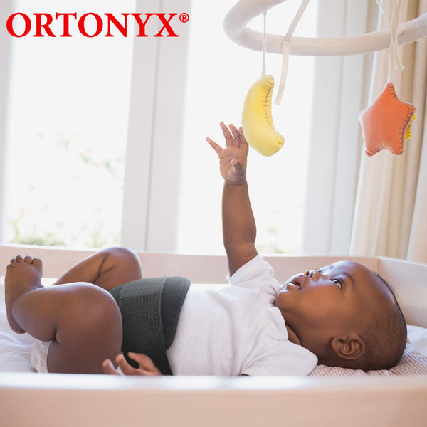 Baby wearing ORTONYX Baby Umbilical Hernia Belt OX350 VCOX350, breathable truss for gentle navel compression at rest.