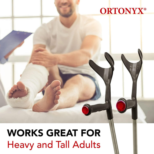 ORTONYX forearm crutches AL01, open cuff with red handle reflectors; aluminum pair beside adult with leg cast in clinic