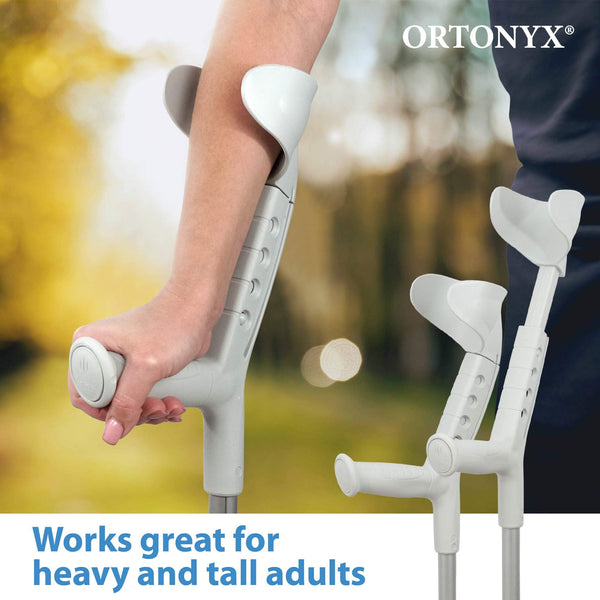 Hand gripping ORTONYX Progress-I adult forearm crutch; adjustable arm support cuff and height; two walking forearm crutches