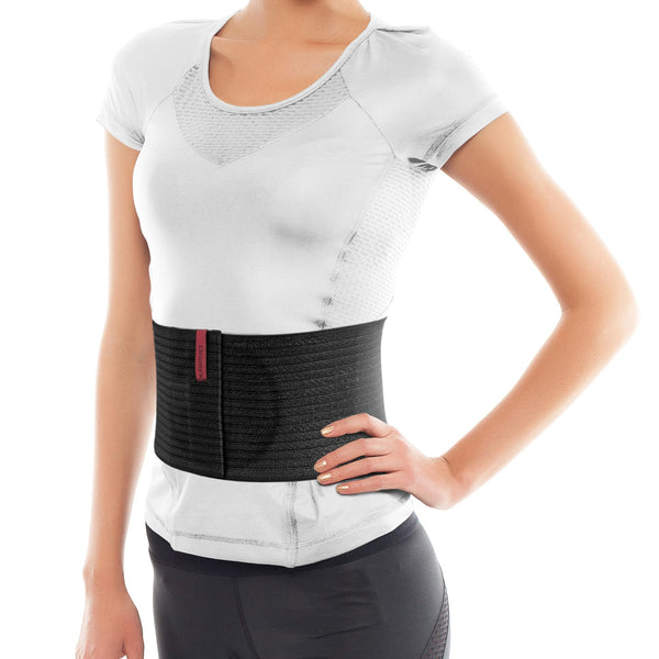 Black ORTONYX umbilical hernia belt, 6.25-inch abdominal support binder worn at waist, front hook-and-loop closure.