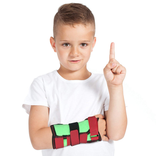 Child wearing ORTONYX Kids Wrist Support ACJB2302GRN, green/red pediatric wrist brace splint, child wrist immobilizer.
