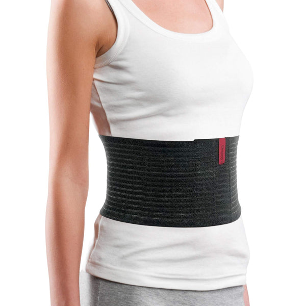 Model wearing ORTONYX 6.25 inch abdominal binder, ribbed breathable elastic lumbo-sacral support wrap around midsection
