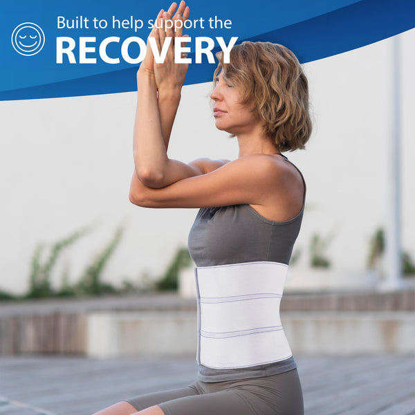 Breathable elastic abdominal binder on woman practicing yoga, wide postoperative compression support and umbilical hernia belt