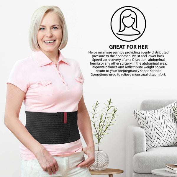 Woman wearing black ORTONYX 6.25 inch abdominal binder, breathable elastic lumbo-sacral wrap with hook-and-loop closure.