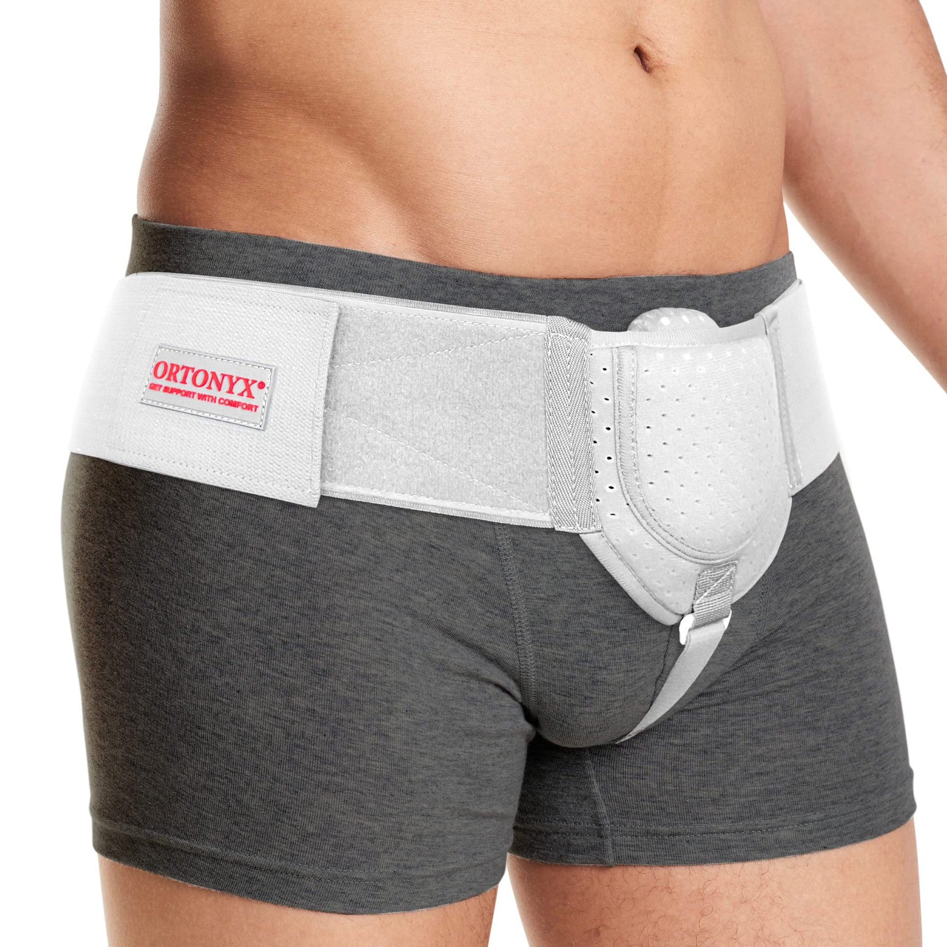 ORTONYX Inguinal Hernia Belt worn on waist, perforated groin support pad and adjustable hook-and-loop straps