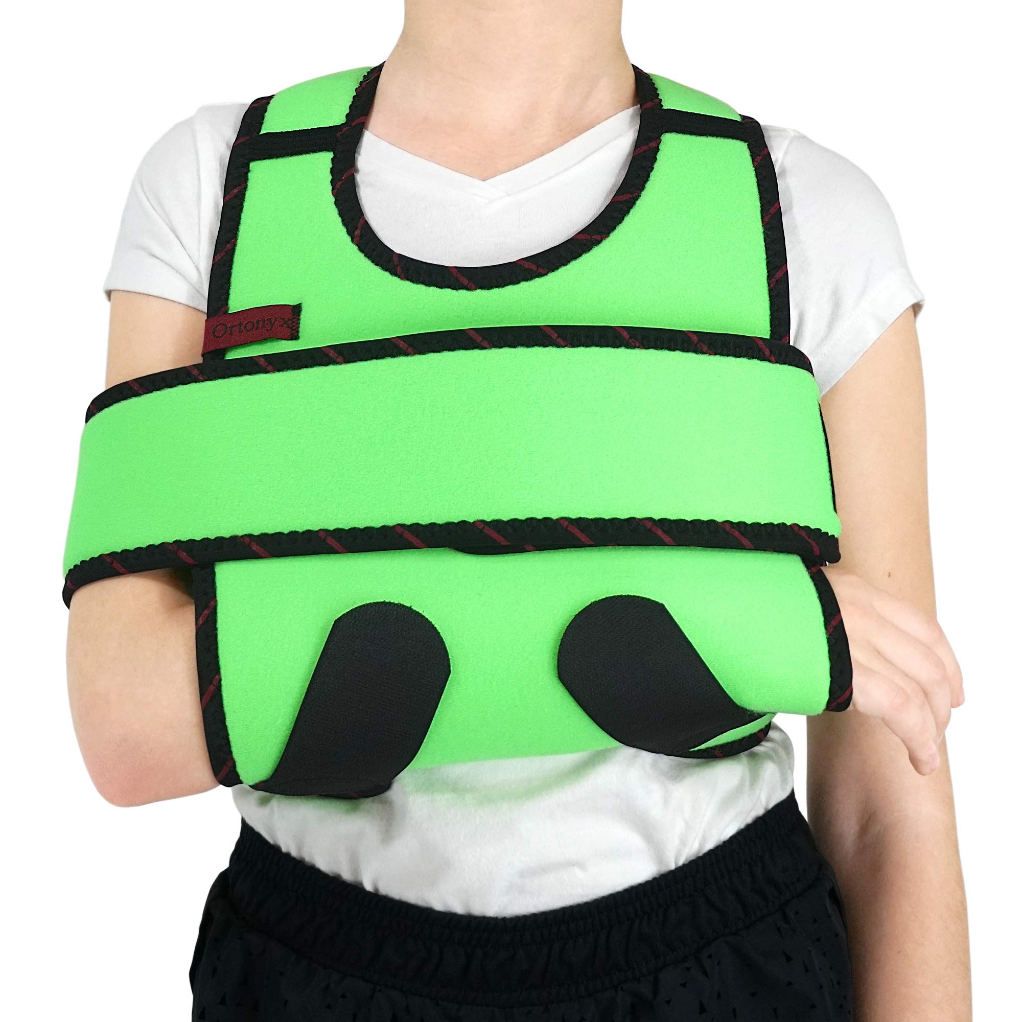 Child in ORTONYX ACJB2409 kids arm sling shoulder immobilizer brace with swathe, hook-and-loop straps, rotator cuff support.