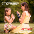 ORTONYX boxer fracture splint ACKB434 on right hand, pinky finger brace immobilizing 4th–5th digits; breathable gray design