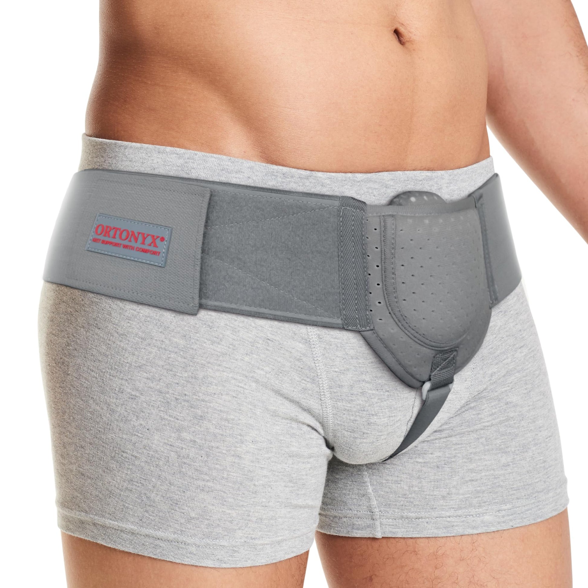 ORTONYX inguinal hernia belt with perforated anatomical pad and adjustable hook-and-loop waist strap, groin support truss