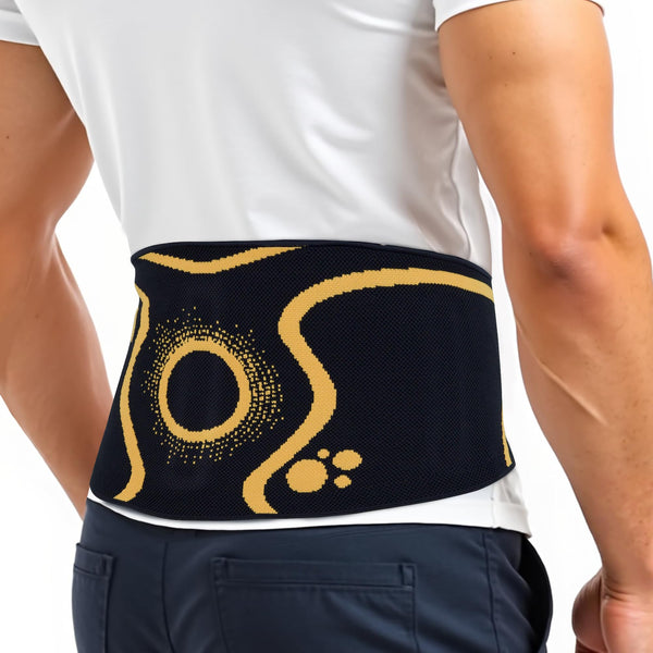 ORTONYX KB726 3D knitted lumbar support brace worn on waist, breathable elastic fabric with contoured fit and yellow pattern.