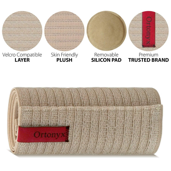 ORTONYX umbilical hernia belt in beige with Velcro-compatible layer, breathable fabric, and removable silicone hernia pad.